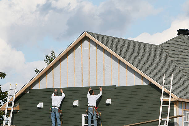 Professional Siding Replacement technician working in Lancaster, TX